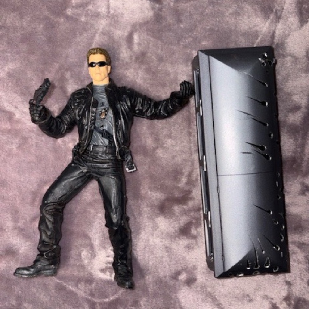 Action Figure with Black Jacket and Accessories